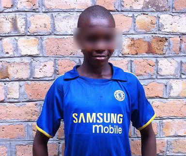 James at Obo office (eyes blurred)